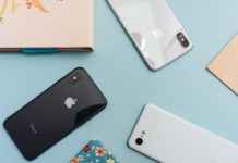 Adjust Announces Collaboration With Salesforce Marketing Cloud on Salesforce AppExchange, the World’s Leading Enterprise Cloud Marketplace space gray iPhone X on blue surface